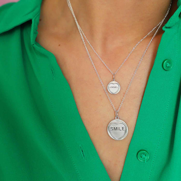 Smile Silver Love Heart Necklace worn on a model