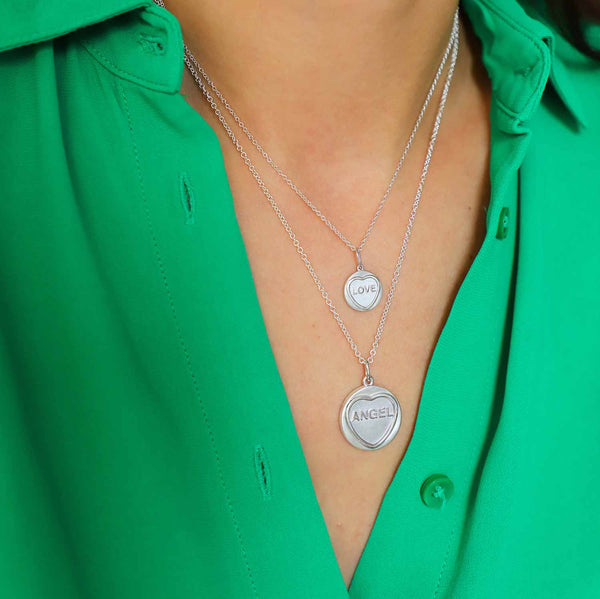 Angel Silver Love Heart Necklace worn on a model