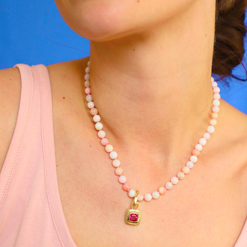 Mr Whippy Pink Opal Bead Necklace worn on a model around the neck with a 'chocolate' pink tourmaline pendant